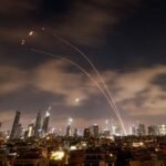Israeli air defense systems intercept Iranian missiles
